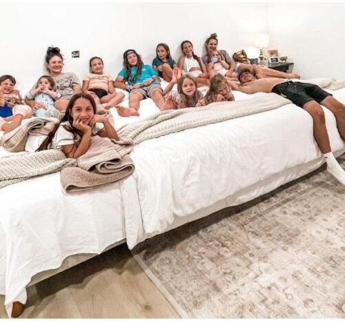 oversized bed with customers in the bed